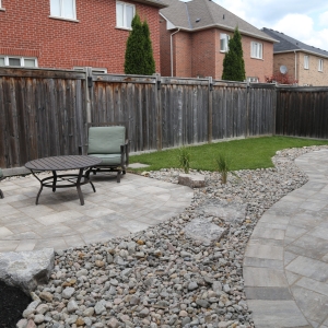 backyard patio and stone landscaping
