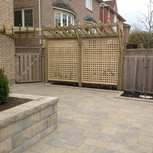 interlock patio and wooden fence