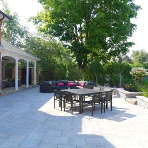 backyard patio with interlock stone
